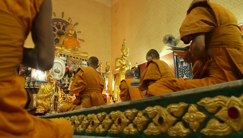 KOH CHANG, THAILAND - DECEMBER 5: Recitation of mantras by monks in a Buddhist monastery Wat Klong Prao, on the occasion of the birth of King of Thailand, December 5, 2011 in Koh Chang, Thailand.