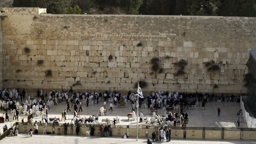 A downward view of the people below at the Western Wall (Wailing Wall) in the early morning in Jerusalem, Israel.   02/26/2011