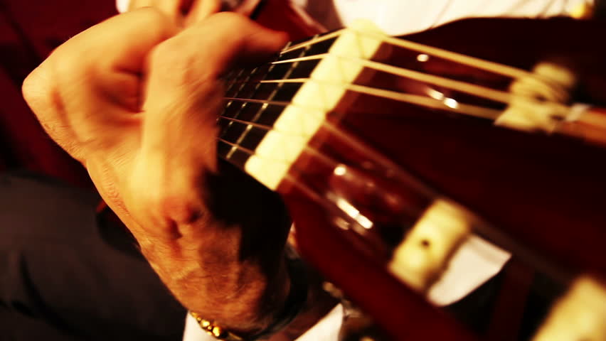 Musician and Acoustic Guitar playing