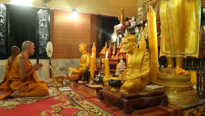 KO CHANG, TRAT/THAILAND - DECEMBER 5: Recitation of mantras by monks in a Buddhist monastery Wat Klong Prao on December 5, 2011 in Ko Chang, Thailand. On the occasion of the birth of King of Thailand.