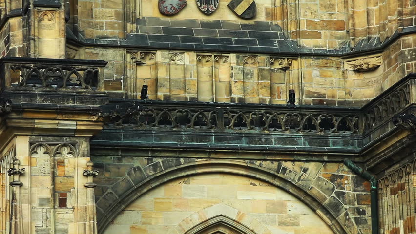Pan on wall - architecture details of cathedral of historical  Prague City