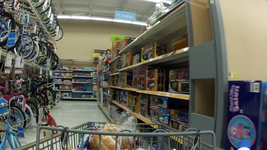 EPHRAM, UT - DEC 13 - Consumers purchase goods at Walmart during the busy holiday season December 13, 2011 in Ephram, Utah.