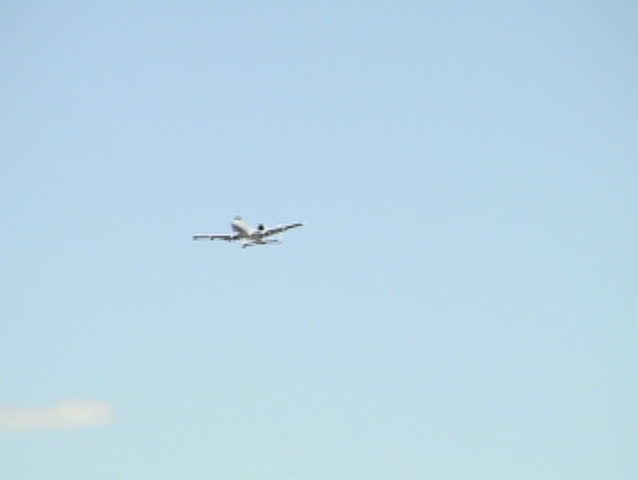 Flyby of an A-10 "Thunderbolt" doing a 4-point roll. Reno AirShow, Nevada.