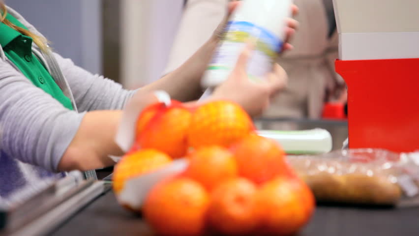 Shopper paying for products at checkout