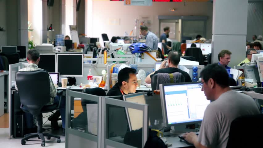 MOSCOW - MAY 6: Several people work in office of Russian Information Agency RIA Novosti - one of major news agencies in Russia, on May 6, 2011 in Moscow, Russia.