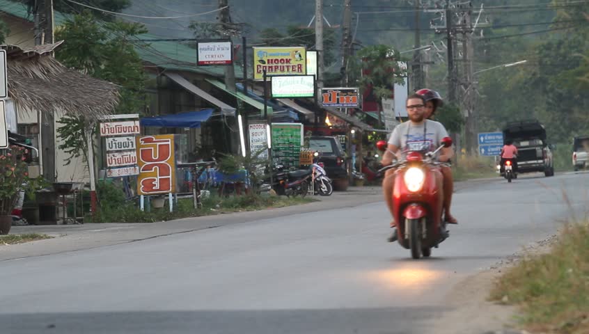 KO CHANG, THAILAND - DECEMBER 12: Traffic on the ring road of the island of Ko Chang in connection with the beginning of tourist season on December 12, 2011 on Ko Chang, Thailand.