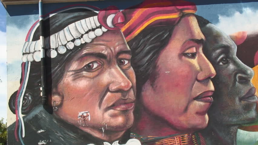 VALPARAISO, CHILE -  CIRCA 2010: A beautiful wall painting in Valparaiso, Chile depicting indigenous people