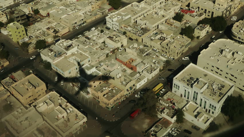 on a plane over the city
