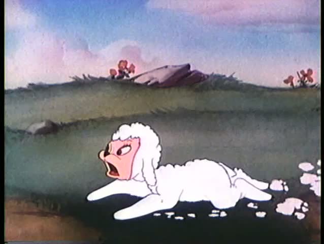 Cartoon of weapons pointed at lamb's head