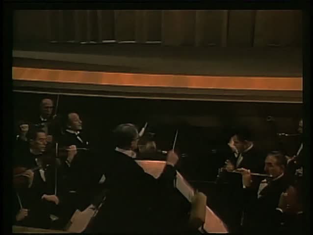 Curtain rising in theater as play begins