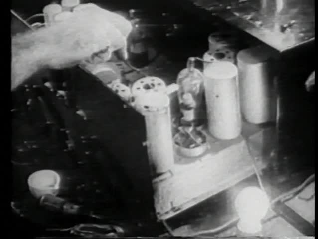 Close-up hand testing electronic equipment
