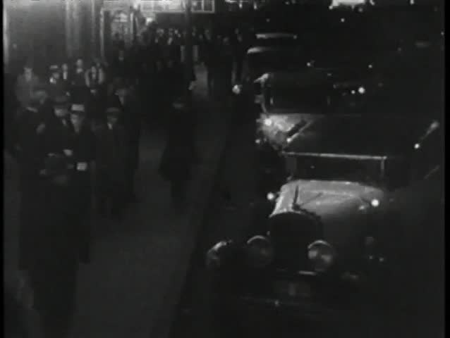 Cabs lining New York City street, 1930s