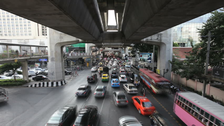 BANGKOK - NOVEMBER 19 (Timelapse view): View of the traffic under the Siam BTS Station in Bangkok on November 19, 2011.