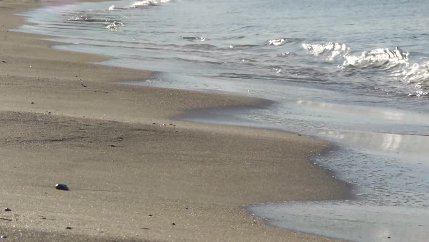 Waves rolling on to the beach