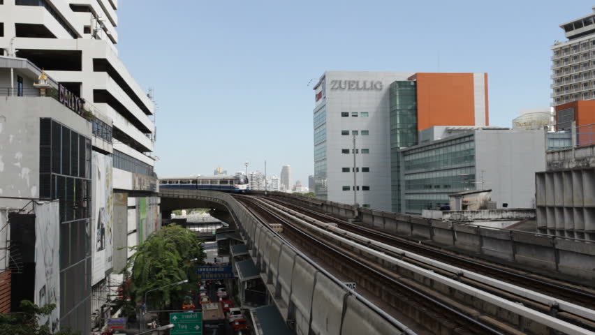 BANGKOK - NOVEMBER 27: A train arrives at the Sala Daeng BTS Station on November 27, 2011. The BTS is Bangkok's aerial metro transportation.