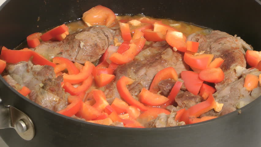 Stewed meat with red pepper.