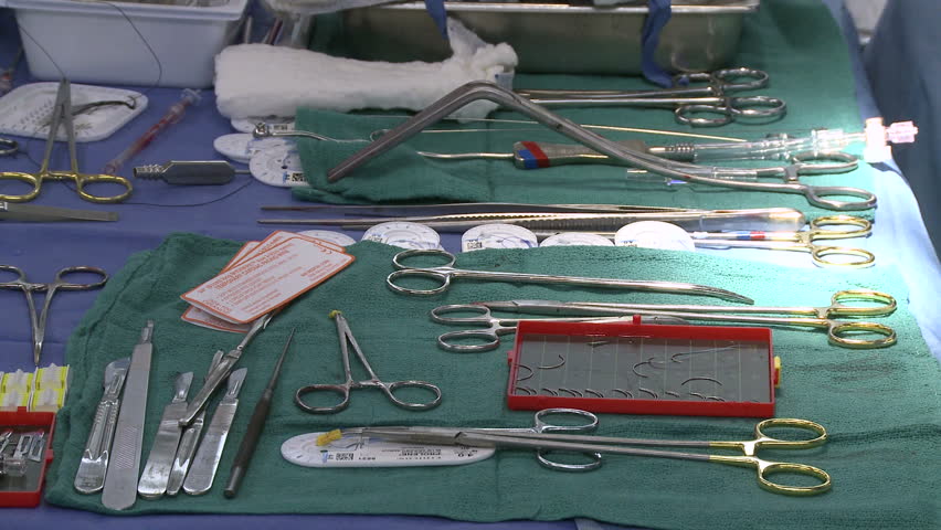 Instruments being taken from table