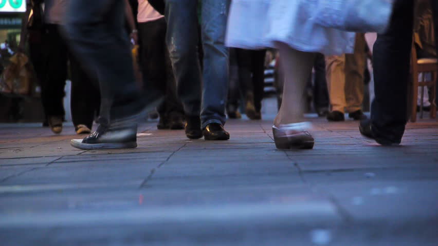 Pedestrians feet walking in city - Crowded Pavement - Background - Full HD
