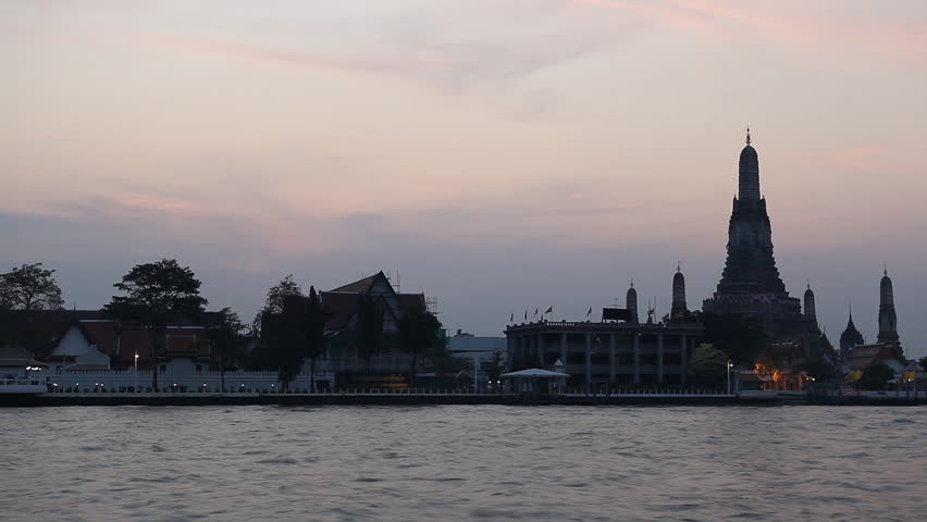 Time Lapse of Wat Arun, Buddhist Temple of the Dawn in Bangkok, Thailand, Chao Phraya River