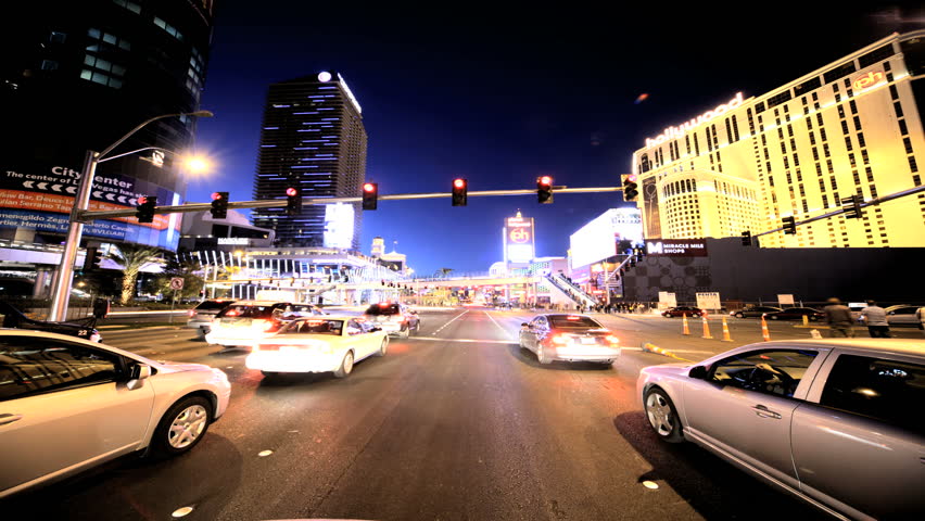 Timelapse point of view driving through the streets of Las Vegas as the sun goes down