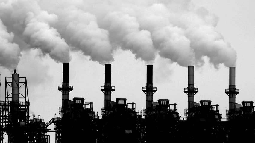 Smoke stacks of petroleum and petro chemical industry refineries