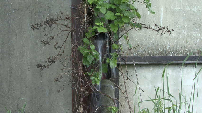 Rainwater leaking from broken drainpipe 4. HD.