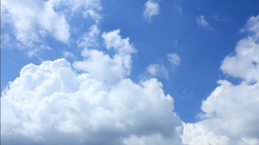 Fantastic time-lapse of moving clouds in the blue sky