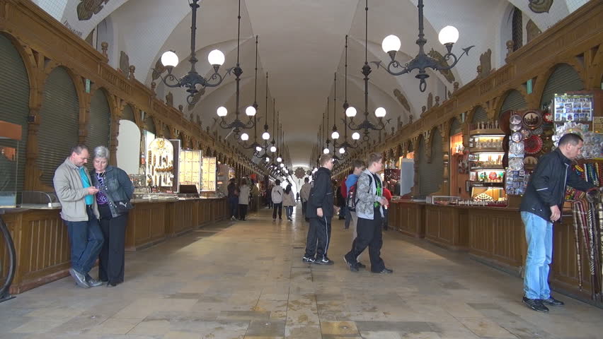 KRAKOW, POLAND- MAY 20, 2011, Unidentified people buy souvenirs in Cloth Hall in Market Square