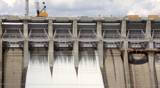 Medium and medium close locked down clips (10 seconds each) of the spillway of the Folsom dam (includes audio).