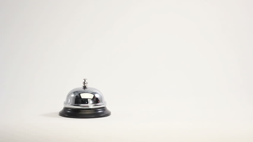 business man ringing reception bell 