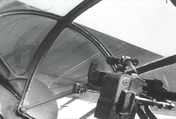 ATLANTIC OCEAN - CIRCA 1942-1944: World War II, U.S. Naval Pilot In Cockpit with Binoculars, publisher National Broadcasting Service (U.S.) 