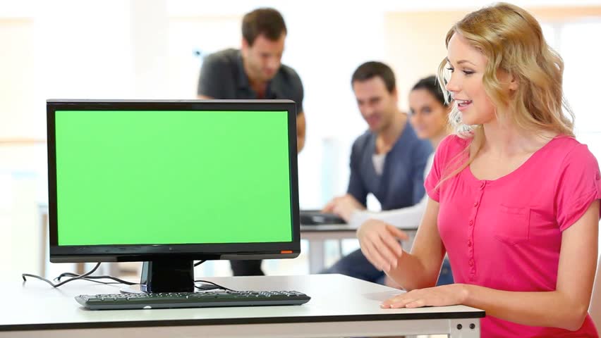 Woman presenting product on desktop computer screen