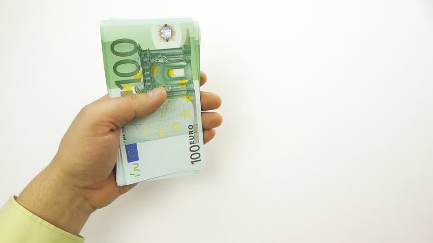 Person counting money (100 euro bills)