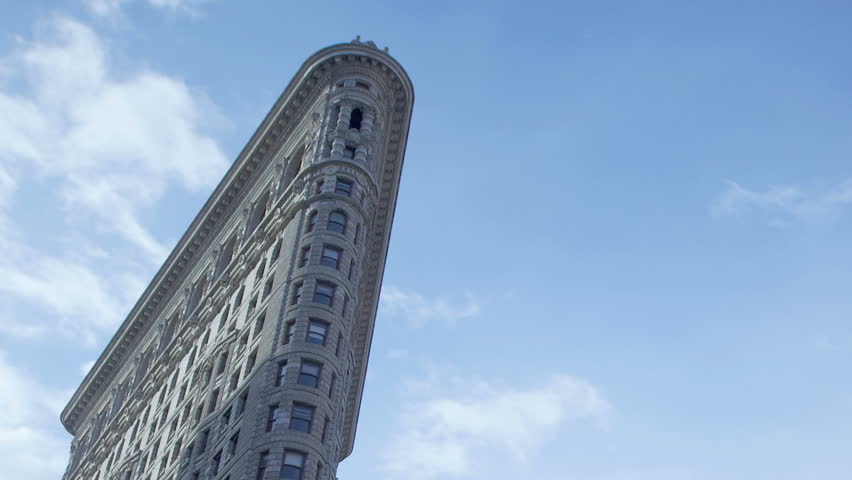 NEW YORK CITY - FEB 12: Timelapse of the Crossing at Flatiron Building at daytime on February 12, 2012 in New York City, USA. 
