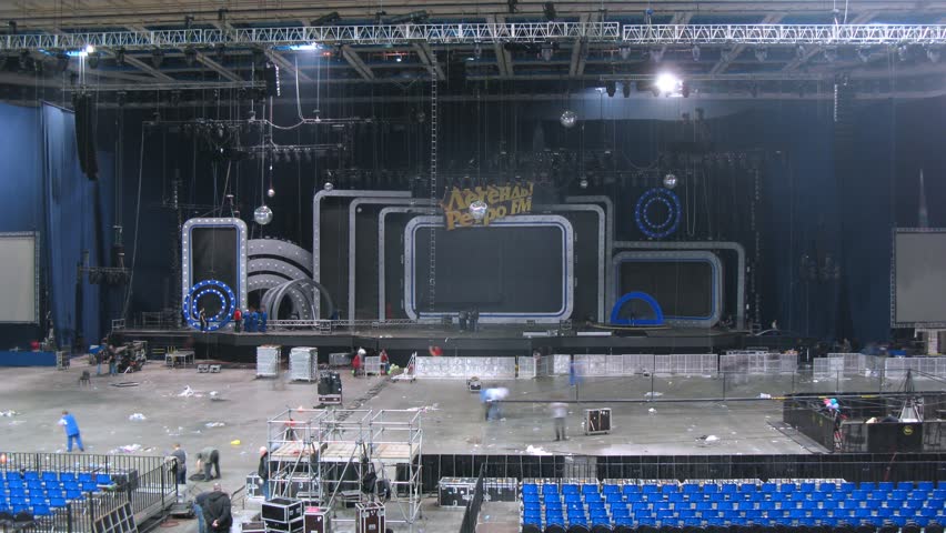 MOSCOW - DEC 17: (Timelapse View) Working scenes dismantle scenery after concert of Legend RetroFM in Sports complex Olimpiyskiy, on Dec 17, 2011 in Moscow, Russia