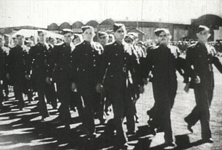 EUROPE - CIRCA 1942-1944: World War II, Soldiers March with Determination