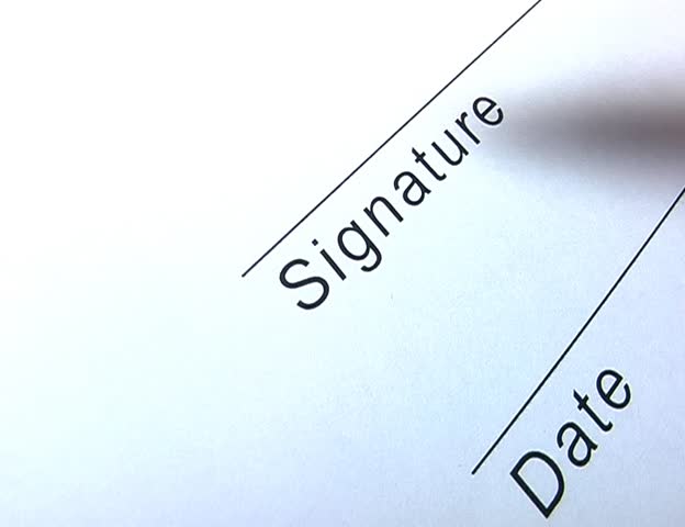 Closeup of signature writing