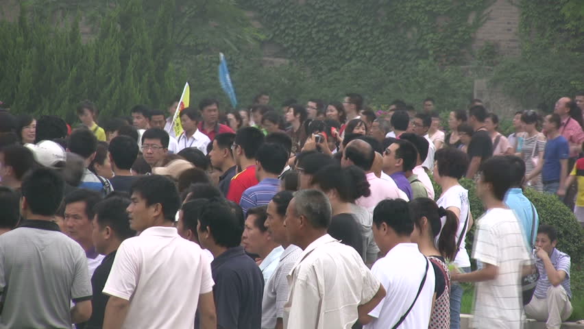 XIAN - 15 JULY 2010: Tourists are waiting to enter one of the pits at the Terracotta Army venue in Xian, China