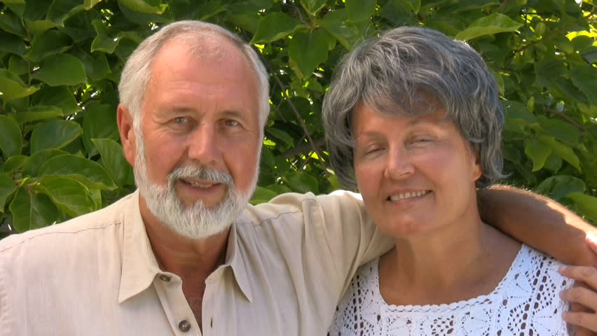 Happy older couple hugging