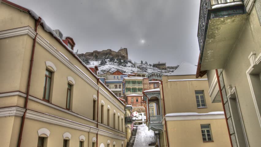 HD time lapse, old city and sun.