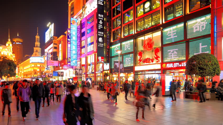 SHANGHAI - CIRCA MARCH 2012: Time lapse of extremely busy pedestrian mall on Nanjing Road circa March 2012 in Shanghai, China.