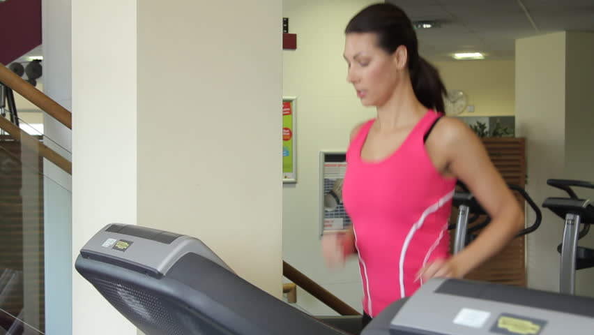 Group running on treadmills, cardio workout exercise in gym