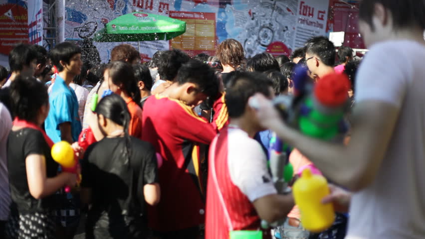 BANGKOK - APRIL 14, 2012: Thai people are celebrating Songkran Water Festival at Siam Square in Bangkok on April 15, 2012. 