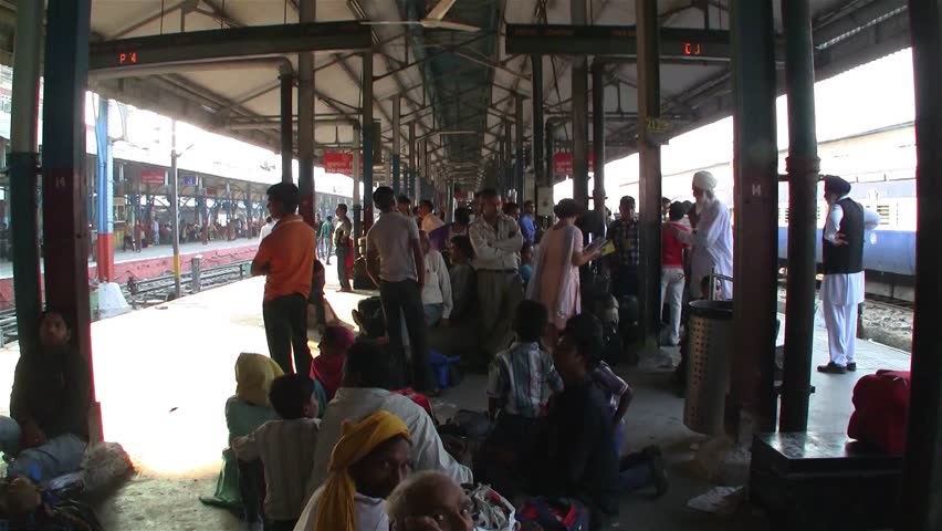 DELHI - NOV 13: People waiting for their trains in the Delhi Junction Railway Station on November 13, 2011 in Delhi, India. Delhi Junction is the oldest railway station of Delhi city.