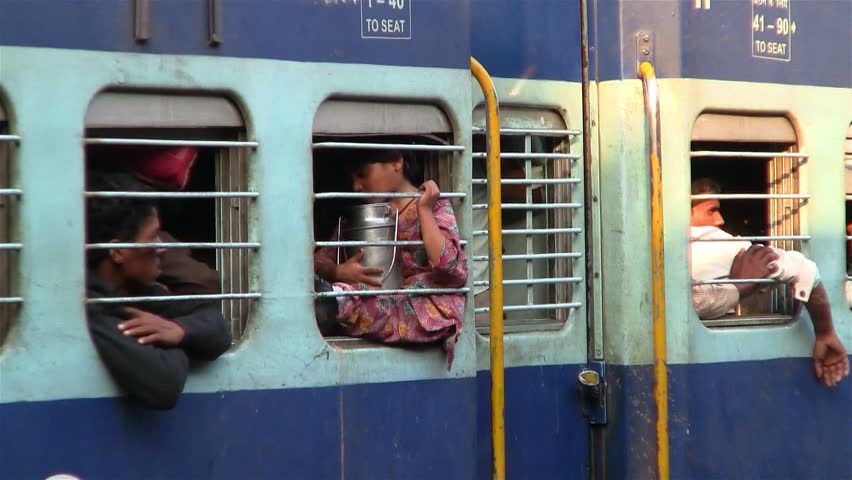 DELHI - NOV 13: People waiting on the train in the Delhi Junction Railway Station on November 13, 2011 in Delhi, India. Delhi Junction is the oldest railway station of Delhi city.