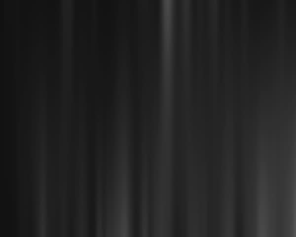 a grey rippling curtain