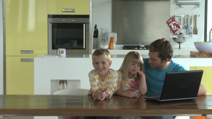 LONG SHOT OF A MOTHER BRINGING HER FAMILY BISCUITS