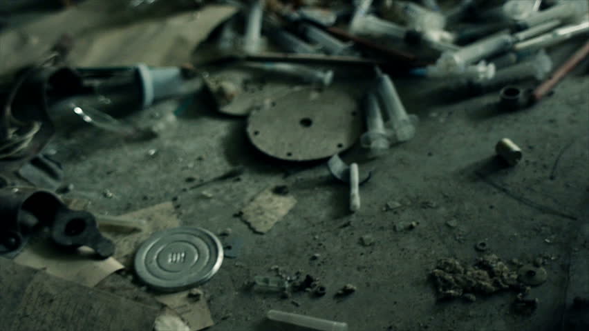 drugs and needles on floor
