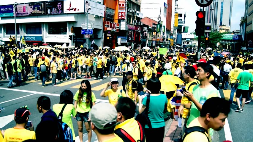 KUALA LUMPUR - APRIL 28, 2012: Protestors march during the Bersih 3.0 rally in Kuala Lumpur, Malaysia on April 28, 2012. The rally was organized by Coalition for Clean and Fair Elections to protest what they perceived as insincere election reforms.