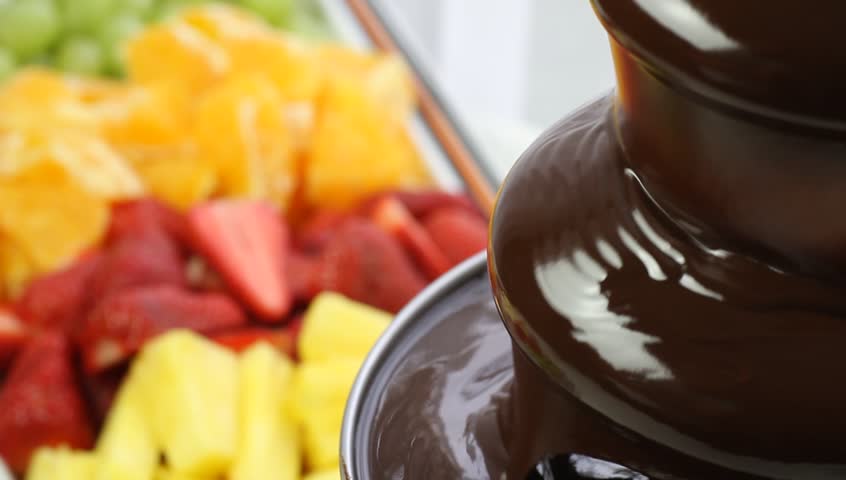 Chocolate fountain and fruit on skewer